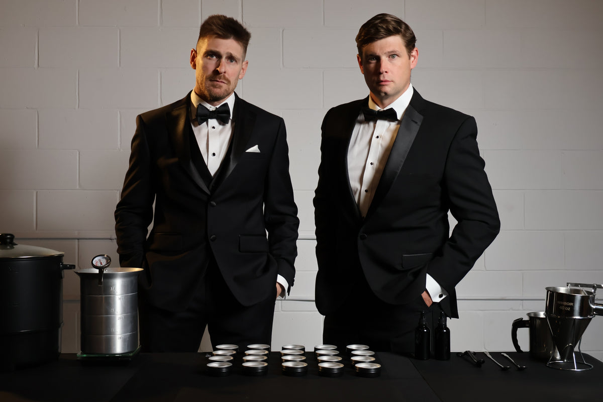 Dean & Dean pouring candles live at an event