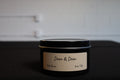 Dean & Dean Palo Santo 8-ounce soy candle with lid on