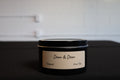 Dean & Dean Teakwood 8-ounce soy candle with lid on