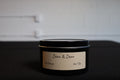 Dean & Dean The Cottage limited-edition 8-ounce soy candle with lid on
